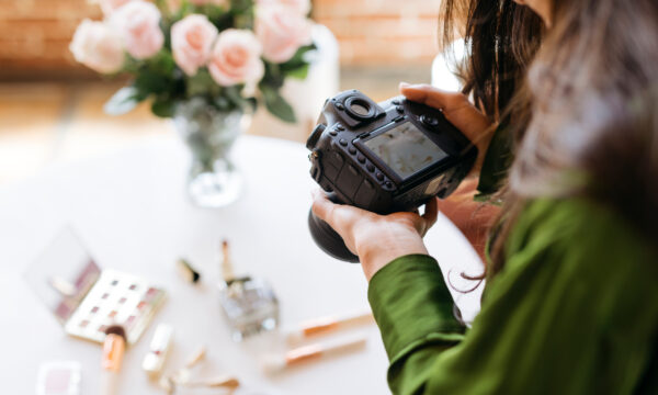 Photographer looking at camera